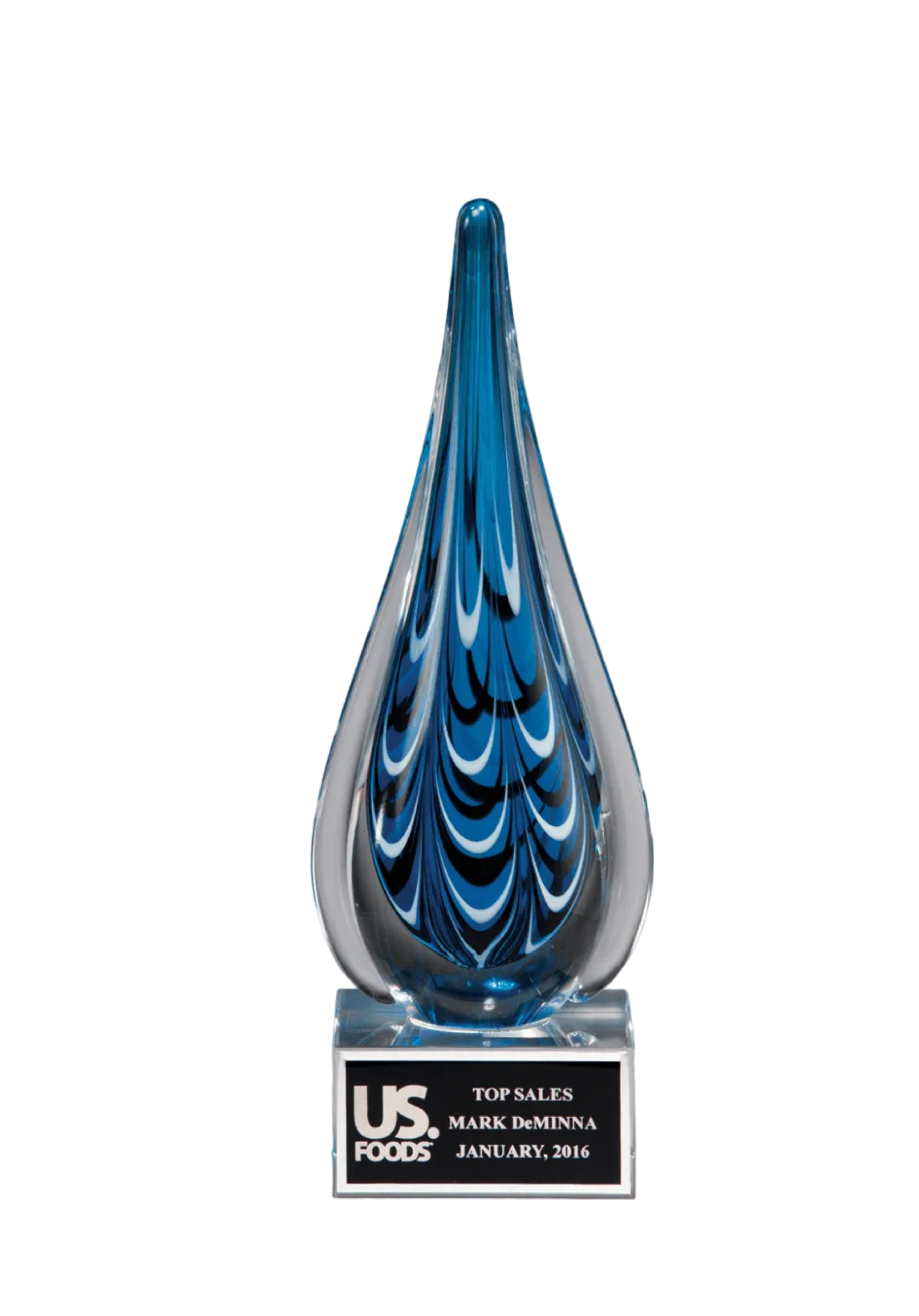 Blue glass award with a black base on a white background