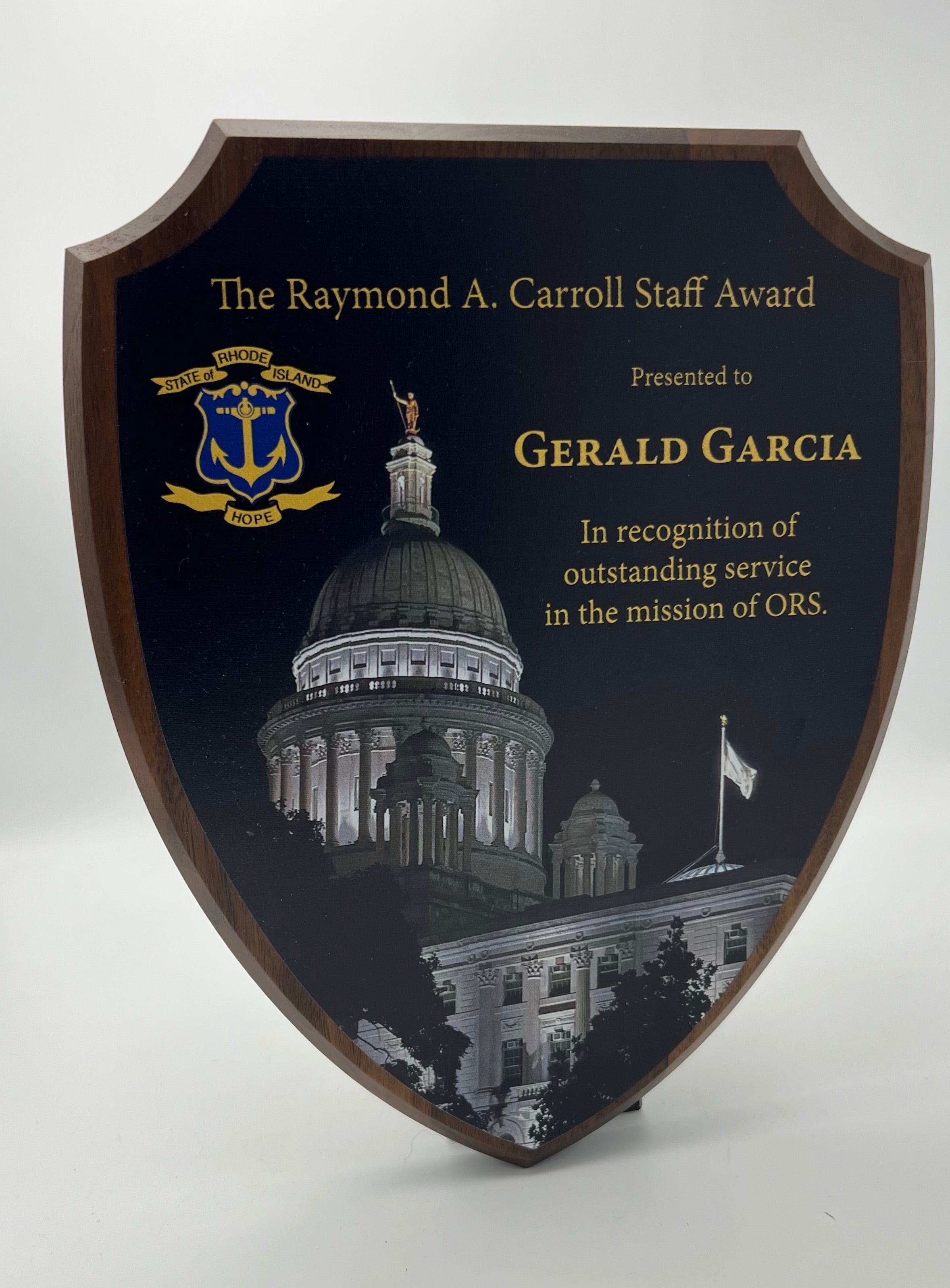 Shield Shaped plaque with Ri State House printed