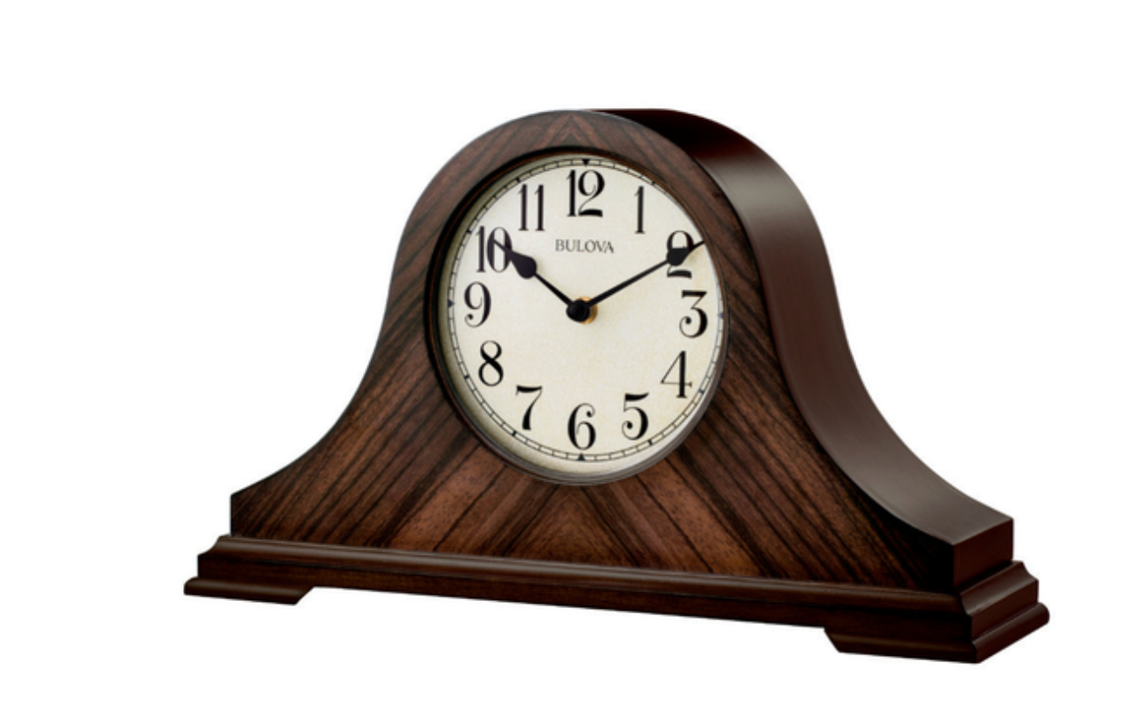 Bulova  clock with off white face 