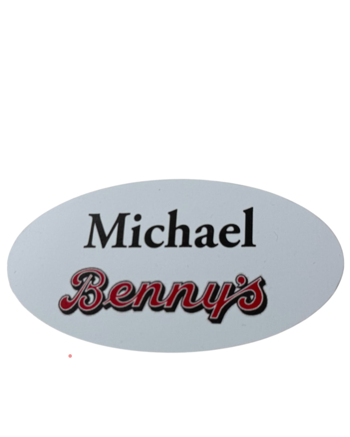 White oval name badge with imprinted name and logo