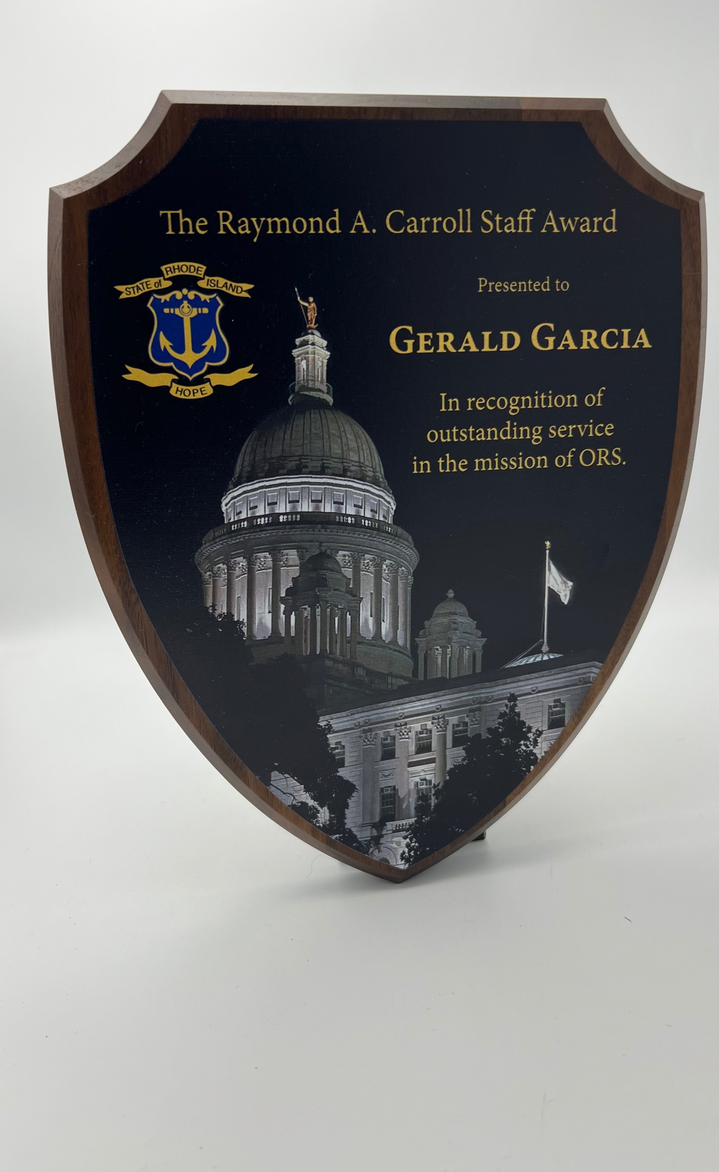 Shield Shaped plaque with Ri State House printed