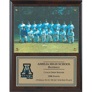 Team photo under plexi with engraved plate