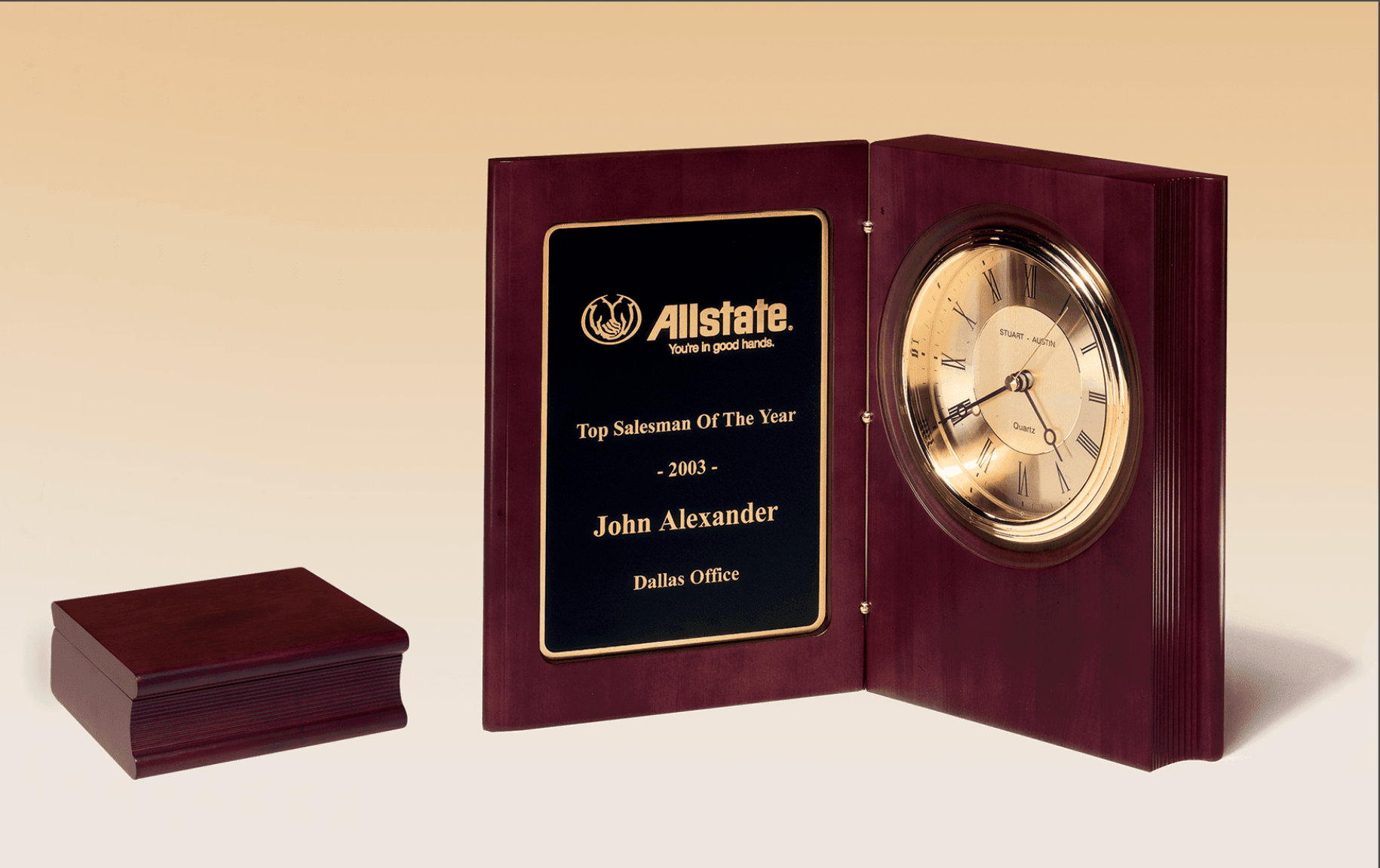 Decorative book clock with engraved plaque on left and clock on right side